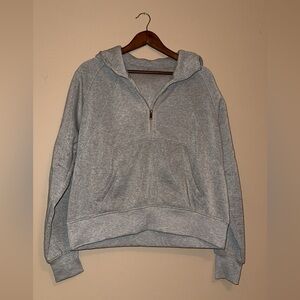 Gray hooded halfzip jacket with ribbing and hood